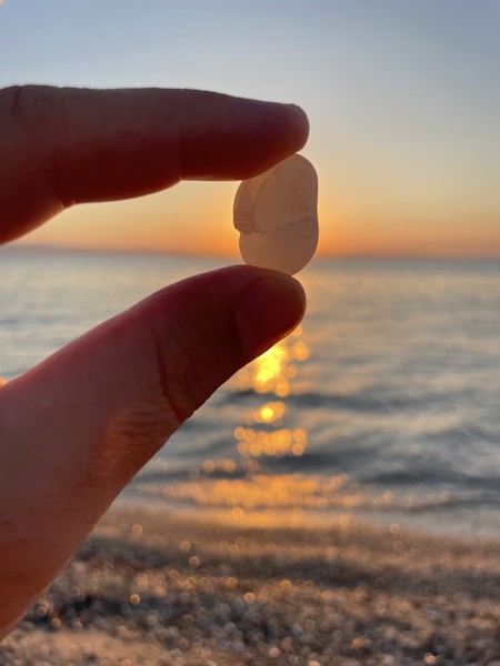 Beach, Body Part, Finger, Hand, Person, Sea, Stone, Sunset