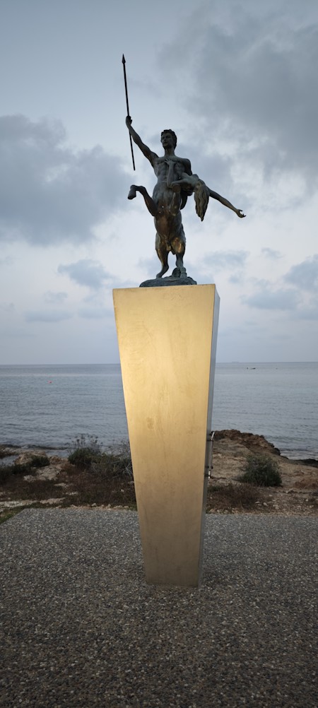 Adult, Architecture, Art, Building, Cyprus centaur mythology sculpture statue public art woman sunset sea coast travel landmark golden hour, Male, Man, Monument, Person, Road