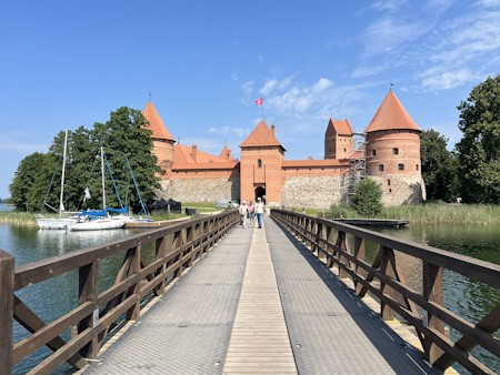 Boat, Car, Flag, Fortress, Person, Pier, Port, Spire, Water, Waterfront