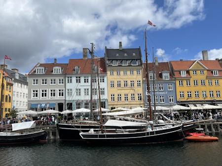 Boat, Flag, Harbor, Marina, Person, Pier, Port, Water, Watercraft, Waterfront