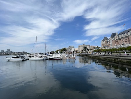 Boat, Flag, Harbor, Marina, Person, Pier, Port, Water, Watercraft, Waterfront