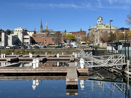Car, Harbor, Metropolis, Person, Pier, Port, Spire, Traffic Light, Water, Waterfront