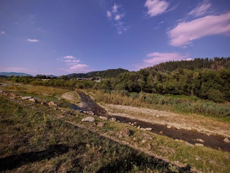 Picture with a river on the sunset