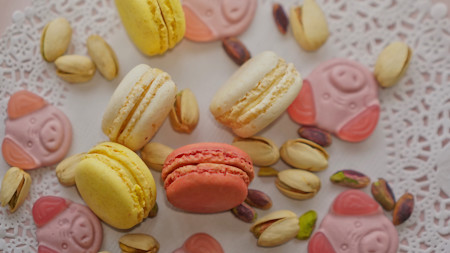 Plate of macaroons and pistachios