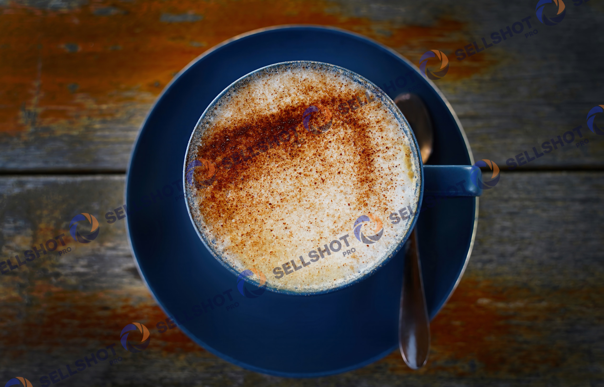 coffee in a blue cup and saucer