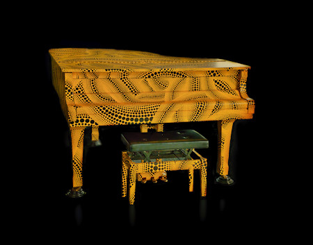 A custom-decorated Yamaha G3A grand piano and matching bench. Supervised and styled by avant-garde artist Yayoi Kusama using her signature yellow-and-black polka-dot motif. Displayed on the 45th-floor South Observation Deck of the Tokyo Metropolitan Government Building in Shinjuku, Tokyo